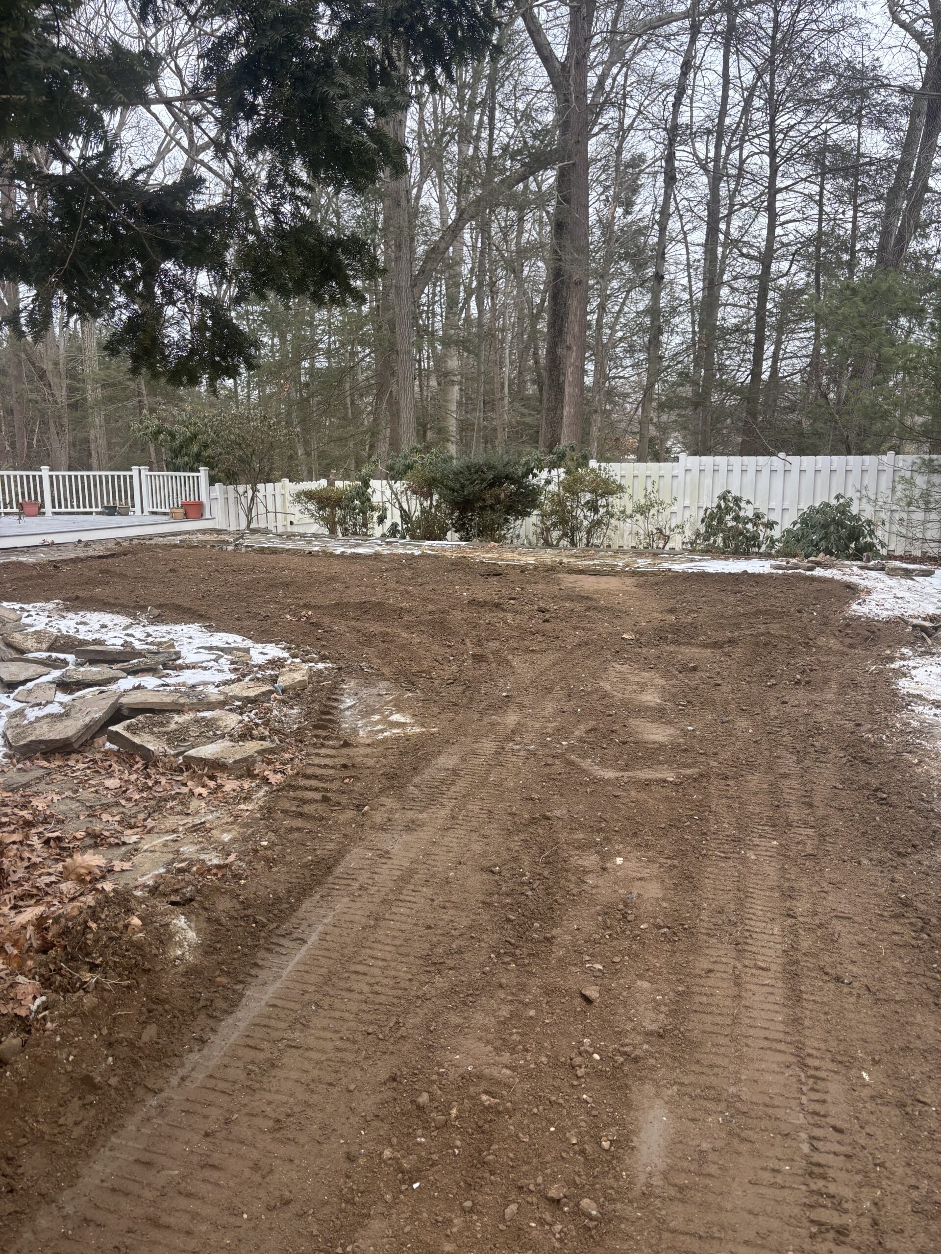 Pool area filled in with dirt and graded