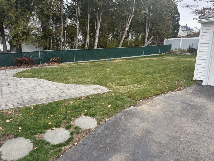 Completed Stratford CT pool removal with new sod lawn—clean, usable yard where the vinyl liner pool used to be